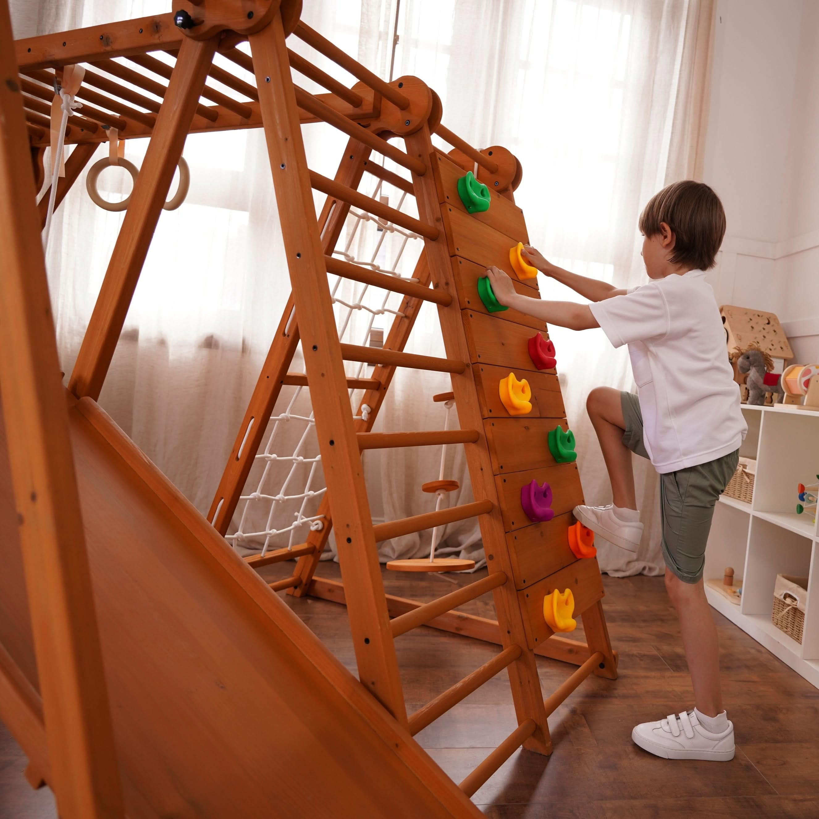 Avenlur outdoor jungle gym rock wall view